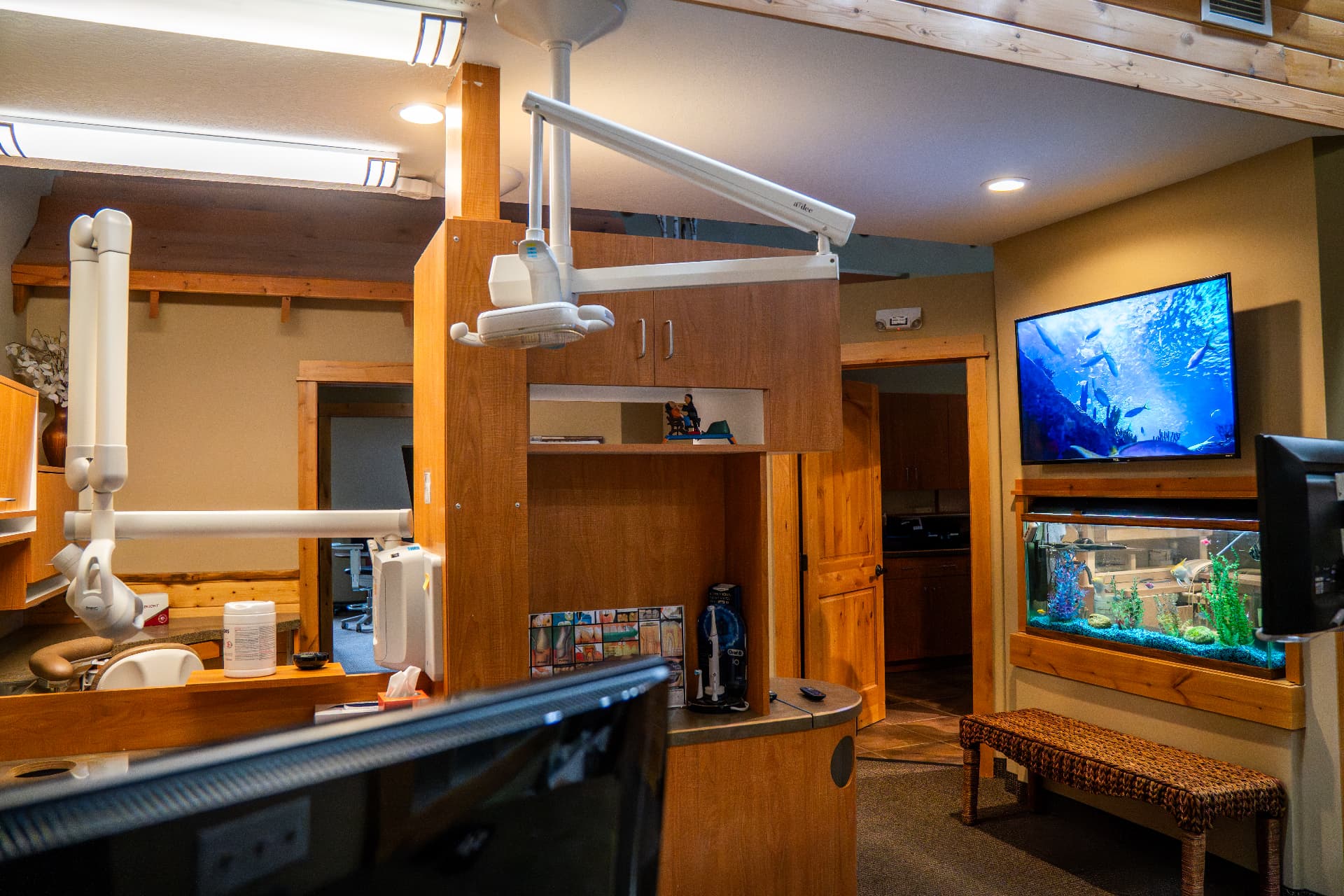 Treatment room with wall-mounted display