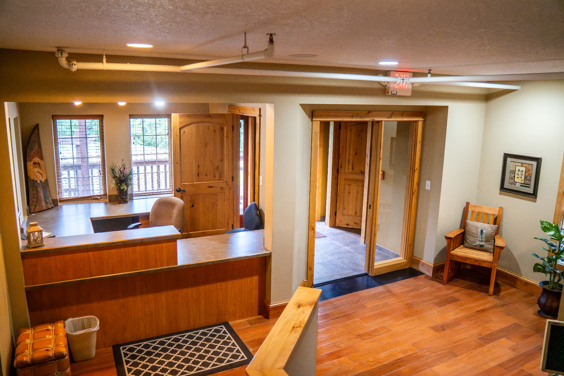 15. The reception desk and check-in window off the entry.
