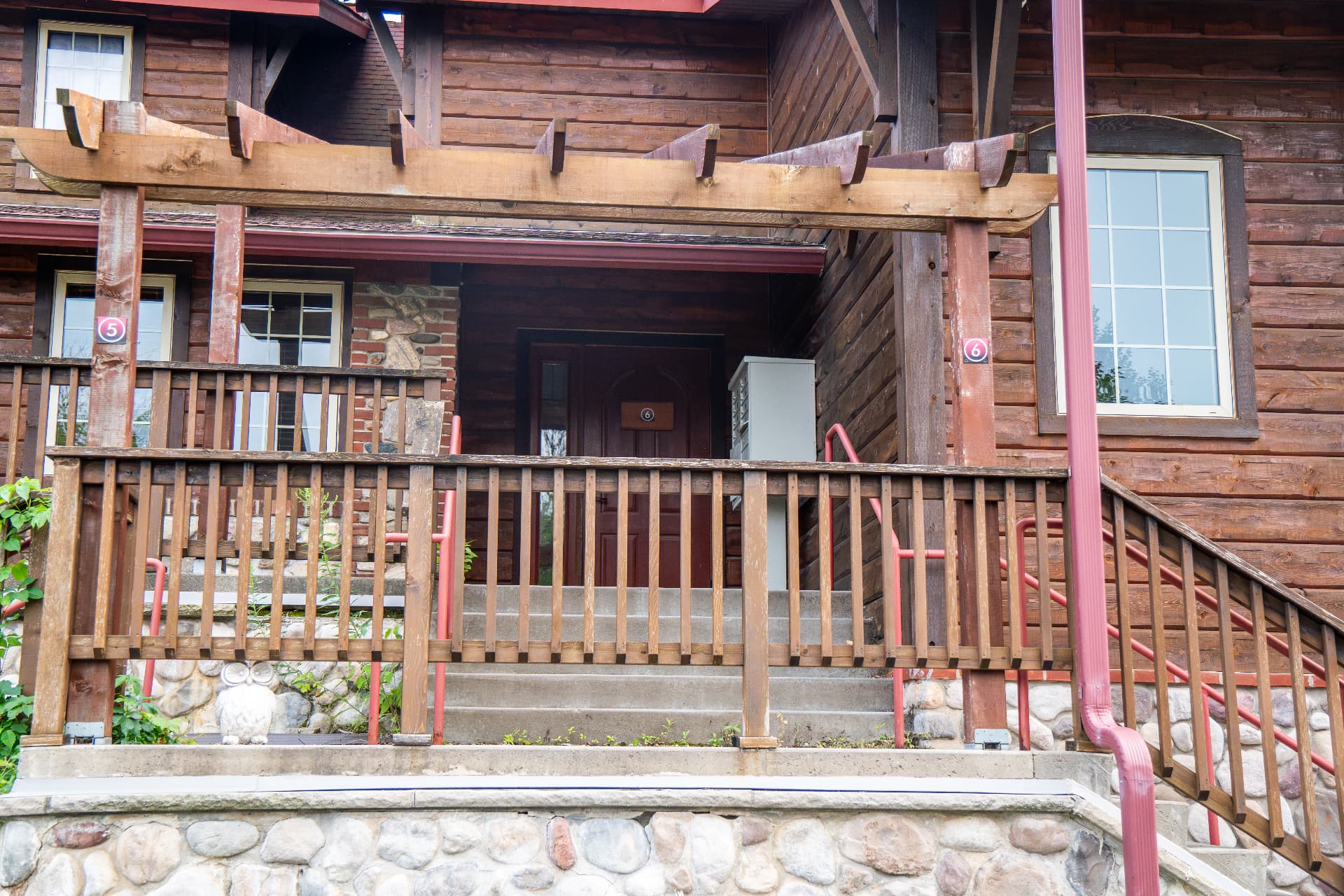 North entrance - stairways up to the main level, doors 5 and 6